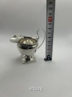 1904-Silver Stylish Cream Jug, Square plinth Hallmark London 1904 Edward Barnard