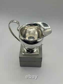 1904-Silver Stylish Cream Jug, Square plinth Hallmark London 1904 Edward Barnard