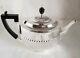 A Victorian Sterling Silver Tea Pot. London 1900. By William Hutton & Sons Ltd