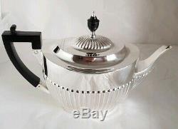 A Victorian sterling silver Tea pot. London 1900. By William Hutton & Sons Ltd