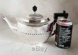 A Victorian sterling silver Tea pot. London 1900. By William Hutton & Sons Ltd