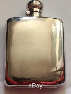 A late victorian James Dixon & son Ltd solid silver hip flask