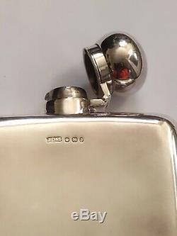 A late victorian James Dixon & son Ltd solid silver hip flask