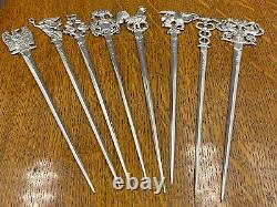 A set of 8 Victorian sterling silver game / meat skewers London 1846