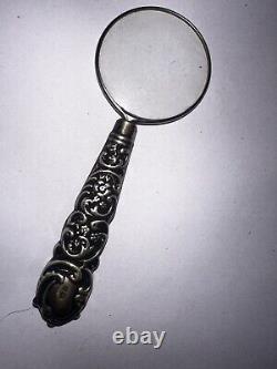 Antique Victorian sterling silver magnifying glass, repousse