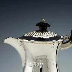 Four Piece Sterling Silver Tea and Coffee Service 1895