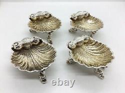 Set Of four Victorian Solid Silver Shell Salts on Raised Dolphin Feet boxed