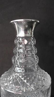 Silver Rimmed Heavy Cut Glass Spirit Decanter dates 1972