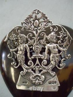 Victorian. Faux Tortoise Shell Hallmarked Silver 1901Letter Clip. (CHERUBS) GREY