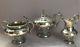 Victorian Silver Three Piece Tea Set With Repousse Scrolled Decoration 1838