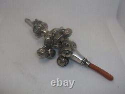 Victorian solid silver and coral babys rattle, teether and whistle
